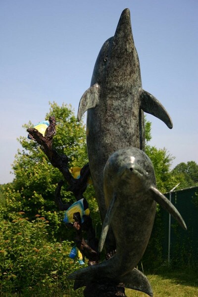 Piped Dolphins Swimming around Coral Bronze Statue with Angel Fishes